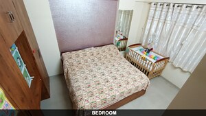 Bedroom in 1 BHK Apartment at Puranik Hometown, Ghodbunder Road – for Sale