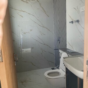 Bathroom in 3 BHK Apartment at Orchid Petals, Sector 49 – for Sale
