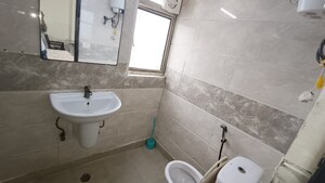 Bathroom in 3.5 BHK Apartment at Amrapali Princely Estate, Sector 76 – for Rent