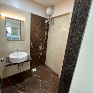 Bathroom in 2 BHK Apartment at SMGK Associate Wood, Jogeshwari West – for Rent