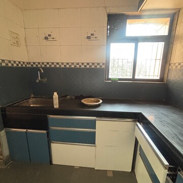 Kitchen in 2 BHK Apartment at Heramba CHS Panvel, Panvel Sector 15a – for Rent