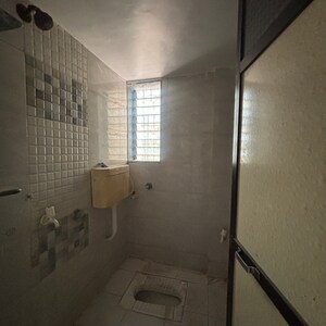 Bathroom in 2 BHK Apartment at Heramba CHS Panvel, Panvel Sector 15a – for Rent