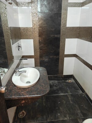Bathroom in 5 BHK Builder Floor at Tagore Park – for Sale