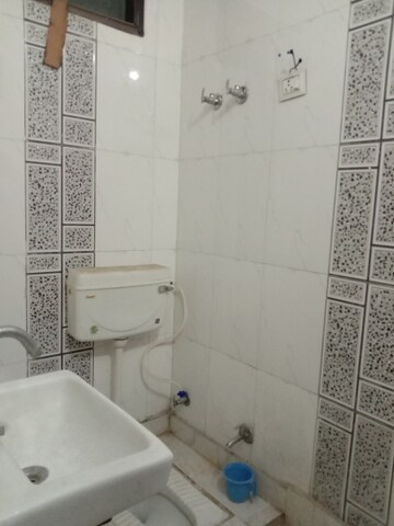 Bathroom in 3 BHK Builder Floor at Dwarka Mor – for Rent