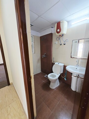 Bathroom in 3 BHK Apartment at Mahagun Moderne, Sector 78 – for Sale