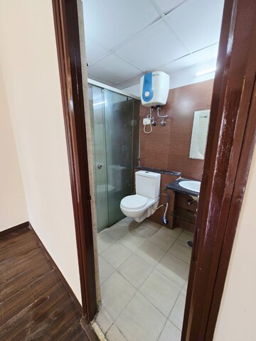 Bathroom in 3 BHK Apartment at Mahagun Moderne, Sector 78 – for Sale