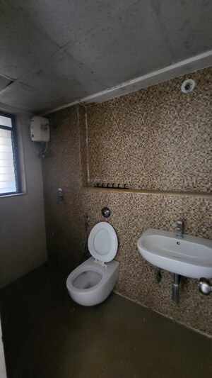 Bathroom in 2 BHK Apartment at Lodha Lakeshore Greens, Dombivli East – for Rent