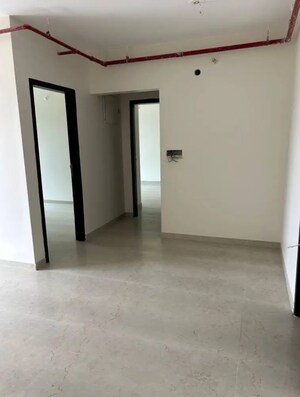 Living Room in 2 BHK Apartment at Dosti West County, Balkum Pada – for Sale