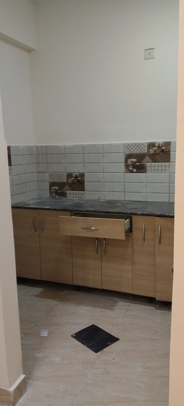 Kitchen in 2 BHK Apartment at Gaur City 2 - 14th Avenue, Sector 16c Greater Noida – for Rent