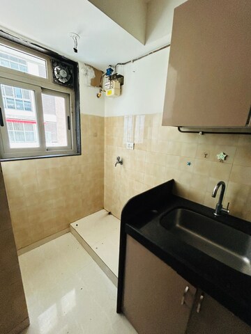 Kitchen in 3 BHK Apartment at Adani Group Western Heights, Andheri West – for Rent