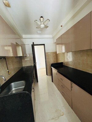 Kitchen in 3 BHK Apartment at Adani Group Western Heights, Andheri West – for Rent