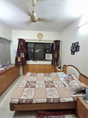 Bedroom in 2 BHK Apartment at Lokhandwala Infrastructure Spring Leaf, Kandivali East – for Rent