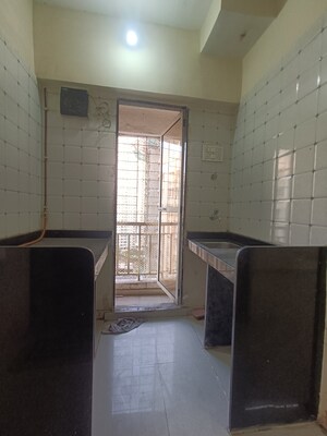 Kitchen in 1 BHK Apartment at Seven Eleven Apna Ghar II, Mira Road – for Sale