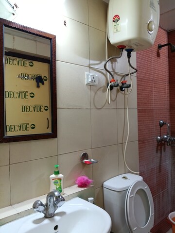 Bathroom in 3 BHK Apartment at Mahagun Mywoods, Sector 16c Greater Noida – for Rent