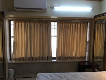 Bedroom in 2 BHK Apartment at Brighton Tower, Andheri West – for Rent