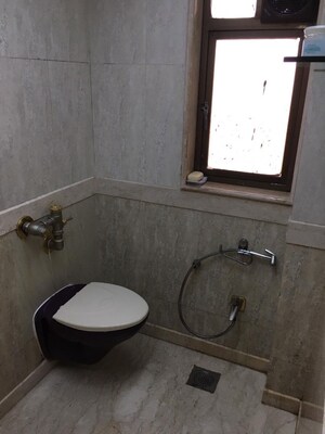 Bathroom in 2 BHK Apartment at Brighton Tower, Andheri West – for Rent