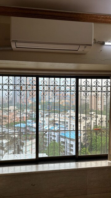 Living Room in 2 BHK Apartment at Brighton Tower, Andheri West – for Rent