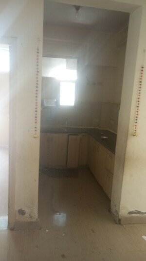 Kitchen in 2 BHK Apartment at SCC Heights, Raj Nagar Extension – for Sale
