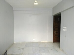 Living Room in 1 BHK Apartment at Hiranandani Gardens Cypress, Powai – for Rent