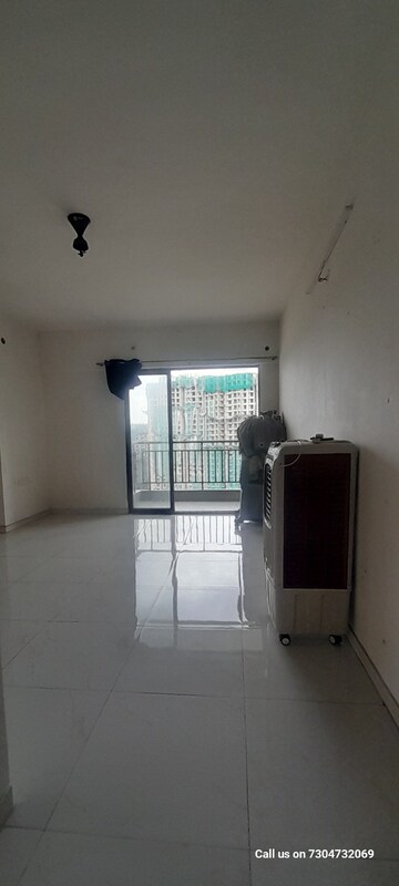 Living Room in 1 BHK Apartment at Runwal Gardens, Dombivli East – for Rent