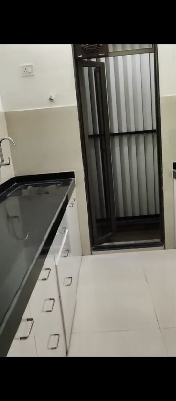 Kitchen in 1 BHK Apartment at Runwal My City, Dombivli East – for Rent