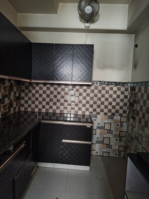 Kitchen in 4 BHK Apartment at Ramprastha Coral Heights, Ramprastha Greens – for Rent