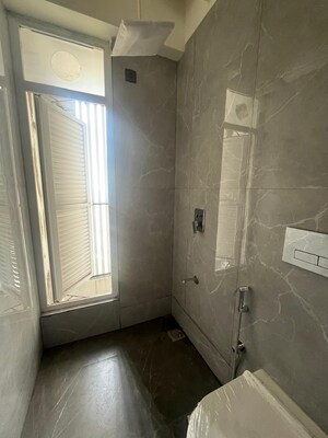Bathroom in 3 BHK Apartment at Ruparel Palacio Phase 1, Kandivali West – for Rent