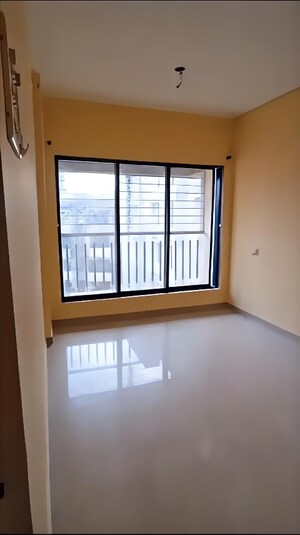 Living Room in 1 BHK Apartment at Sanskruti Heights, Nalasopara West – for Sale