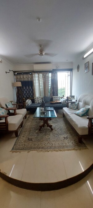Living Room in 2 BHK Apartment at Grenville CHS, Andheri West – for Sale