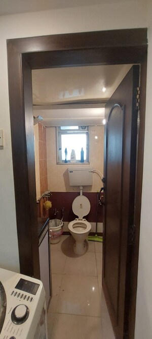 Bathroom in 2 BHK Apartment at Grenville CHS, Andheri West – for Sale