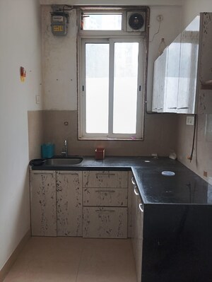Kitchen in 1.5 BHK Apartment at Runwal Forests, Kanjurmarg West – for Sale