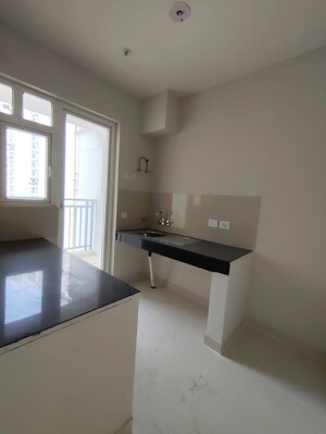 Kitchen in 2 BHK Apartment at Eldeco Live By The Greens, Sector 150 – for Sale