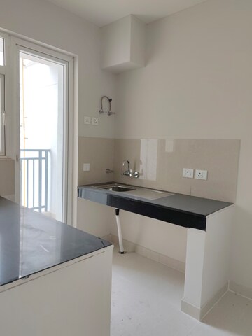 Kitchen in 2 BHK Apartment at Eldeco Live By The Greens, Sector 150 – for Sale