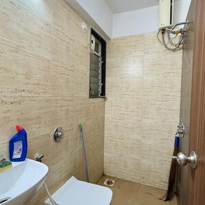 Bathroom in 2 BHK Apartment at Omkar CHS Dadar, Matunga West – for Rent