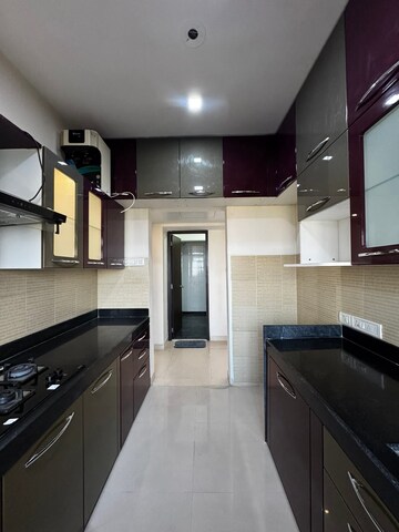 Kitchen in 3 BHK Apartment at Lodha Splendora, Ghodbunder Road – for Rent