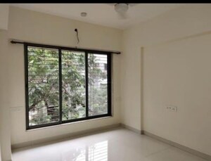 Room in 2 BHK Apartment at Royal Nest Malad West, Malad West – for Rent