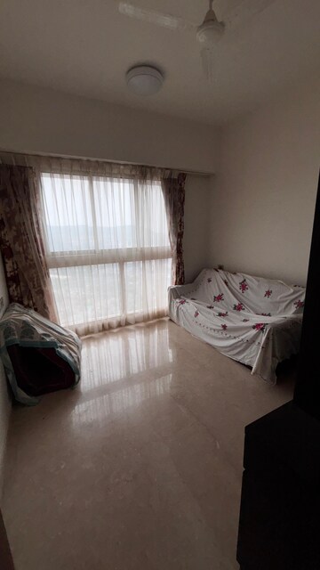 Living Room in 3 BHK Apartment at Omkar Alta Monte, Malad East – for Rent