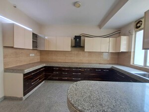 Kitchen in 2 BHK Apartment at Raheja Vedaanta, Sector 108 – for Rent