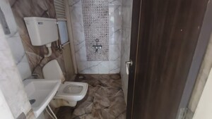 Bathroom in 2 BHK Apartment at Rosa Gardenia, Ghodbunder Road – for Rent