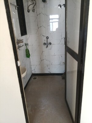 Bathroom in 1 BHK Apartment at Shree Swami Vrindavan SRA CHS, Bhandup West – for Rent