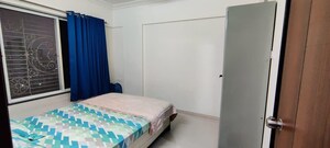 Bedroom in 2 BHK Apartment at GK Royal Hills, Ravet – for Rent