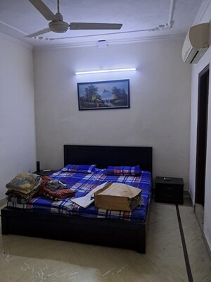 Bedroom in 2 BHK Builder Floor at East of Kailash Block-B RWA, East Of Kailash – for Rent