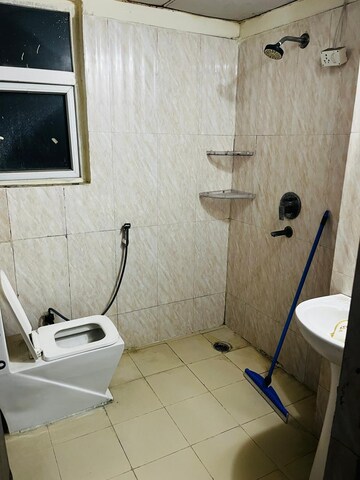 Bathroom in 2 BHK Apartment at Amrapali Cloud Ville, Sector 76 – for Rent