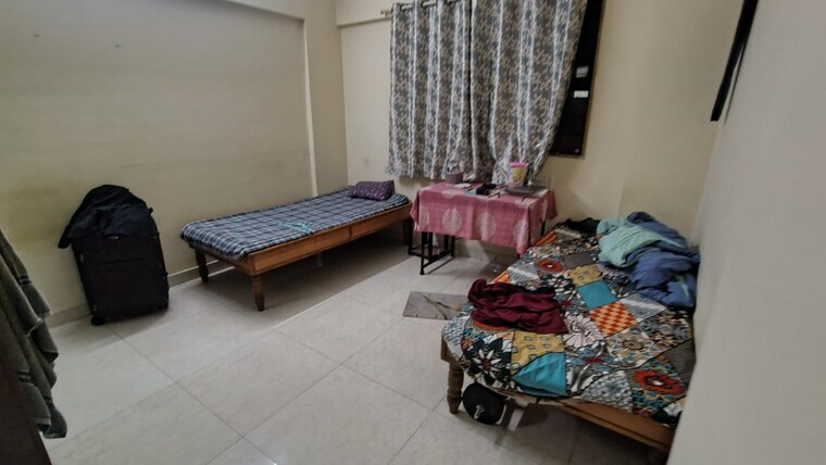 Bedroom, magarpatta-city-cosmos 2 Bedroom 980 Sq.Ft. Apartment In Magarpatta Road Pune 9455234