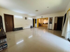 Living Room in 4 BHK Apartment at Kothrud – for Sale