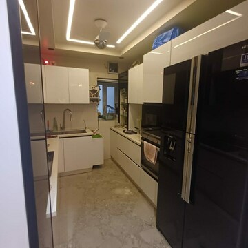 Kitchen in 4 BHK Apartment at DDA Vasundhara Apartments, Rohini Sector 9 – for Sale