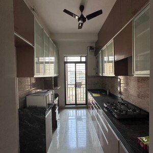 Kitchen in 3.5 BHK Apartment at Harmony Signature Towers, Owale – for Sale