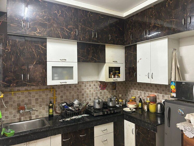 Kitchen, amaatra-homes 2.5 Bedroom 1048 Sq.Ft. Apartment In Sector 10 Greater Noida Greater Noida 9456062