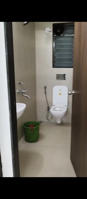 Bathroom in 1 BHK Apartment at Runwal Gardens, Dombivli East – for Rent