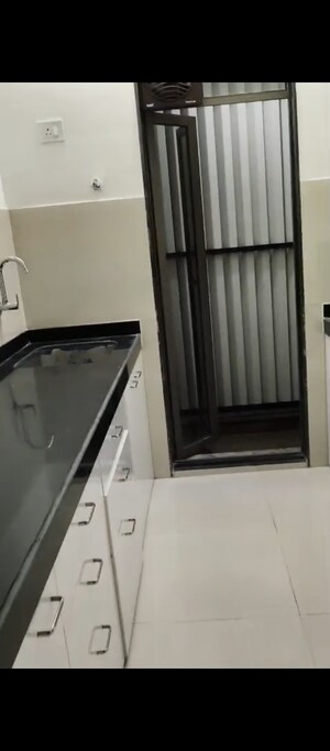 Kitchen in 1 BHK Apartment at Runwal Gardens, Dombivli East – for Rent